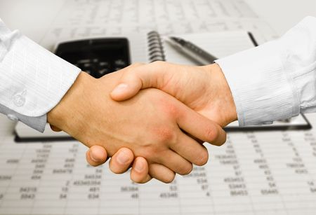 Businessman teamwork partners shaking handsの写真素材