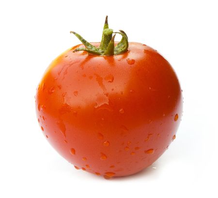 red tomato with drops isolated on white backgroundの写真素材