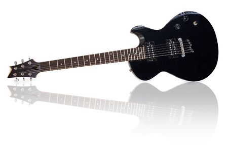 Black electric guitar isolated on white backgroundの写真素材