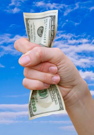 money with hand isoalted on whiteの写真素材