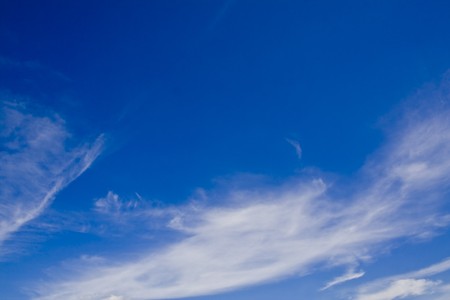 nature background. white clouds over blue skyの写真素材