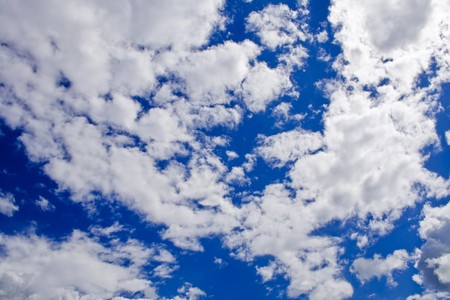 nature background. white clouds over blue skyの写真素材