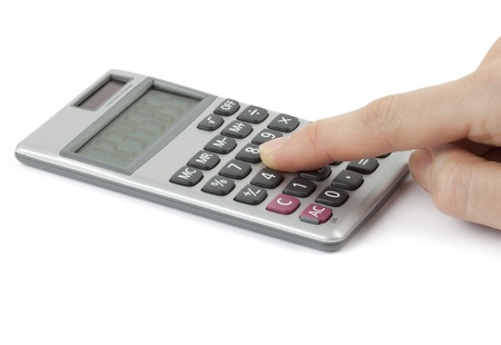calculator with hand isolated on whiteの写真素材