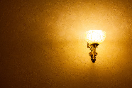 glowing lantern on a wall for advertisingの写真素材