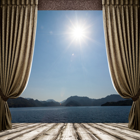 Open curtains on the background of the forest autumn backgroundの写真素材