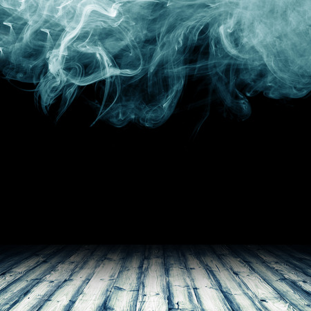 wooden floor against the backdrop of clouds of smokeの写真素材