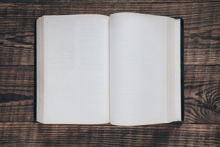 books on the background of woodの写真素材