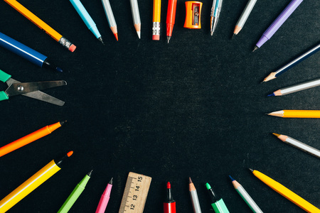 a school supplies on blackboard