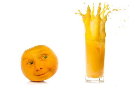 Splash of orange juice on white backgroundの写真素材
