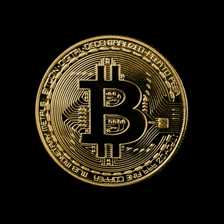 Bitcoin coin on black backgroundの写真素材