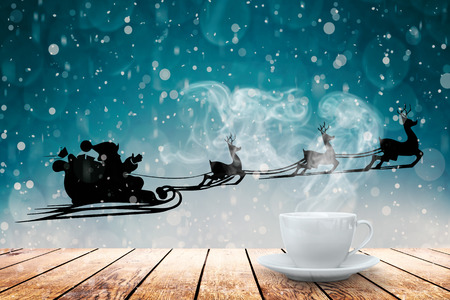 hot coffee on the table on a winter backgroundの写真素材