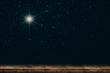 background night sky with stars, moon and clouds. wood floor.の写真素材
