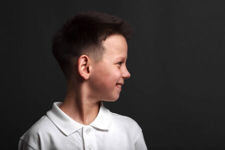 model boy posing on gray backgroundの写真素材