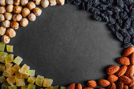 a lot of dried fruits on a black backgroundの写真素材