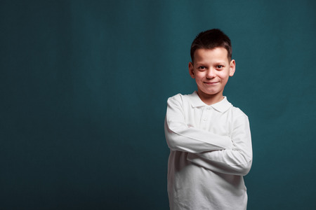model boy posing on gray background
