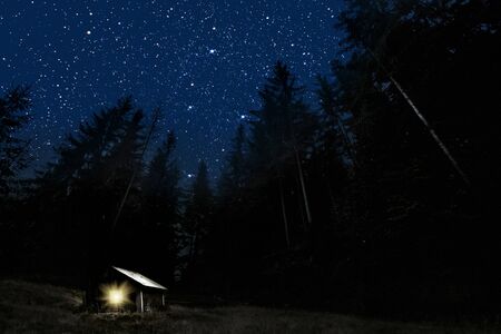 The moon shines over the manger of christmas of Jesus Christ.