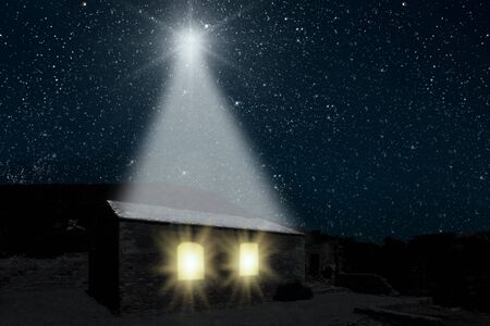 The moon shines over the manger of christmas of Jesus Christ. Elements of this image furnished by...