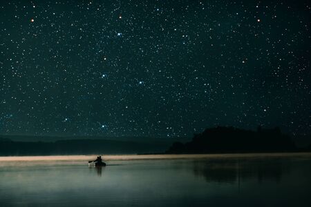 men at dawn sailed for a fishermanの写真素材