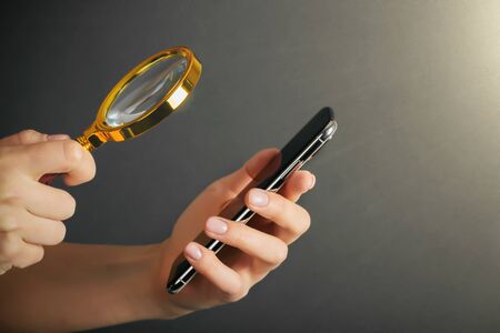 cellphone phone tablet in hand for advertisement on the gray backgrounds