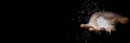 asking hands of a working man in the dark