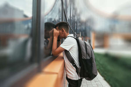 child hurries back to school with a backpack. color school