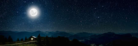 mountain. backgrounds night sky with stars and moon and clouds.