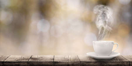 hot coffee on the table on a blur background