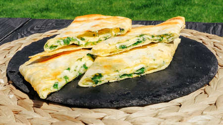 lavash on the grill with juicy cheese