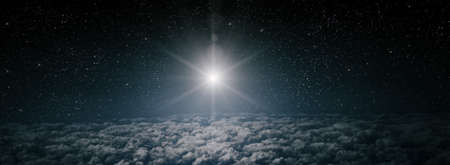 The star shines over the manger of christmas of Jesus Christ.の写真素材