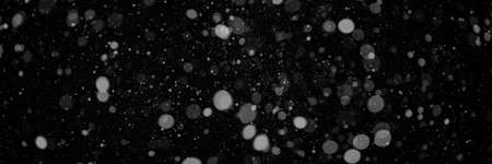 snow on the black backgroundsの写真素材