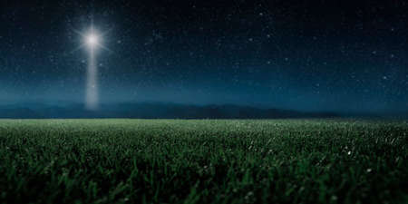 The star shines in the mountains over the manger of christmas of Jesus Christ.の写真素材