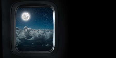 the view from the airplane window on the night skyの写真素材