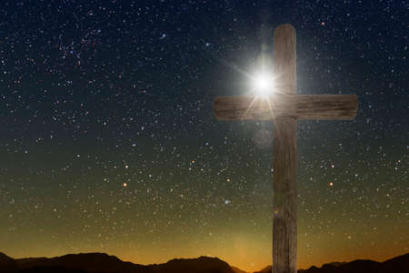 Easter cross on the background of the flag of Ukraineの写真素材