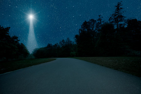 The star shines over the manger of christmas of Jesus Christ.の写真素材