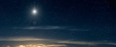 The star shines on the Christmas Eve of Jesus Christ.の写真素材