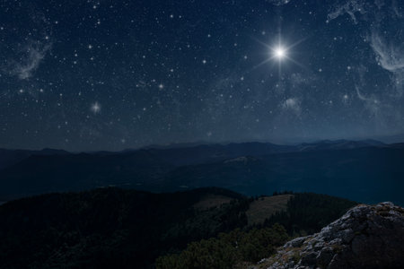The star shines over the manger of christmas of Jesus Christ.の写真素材