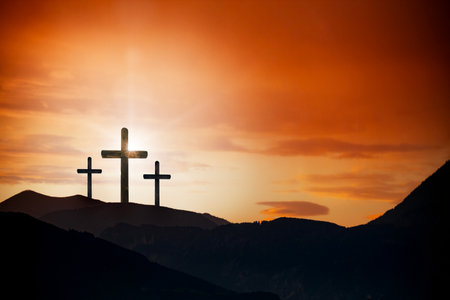 A Easter cross on the dawn backgroundの写真素材