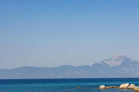 blue transparent sea in the mountainsの写真素材