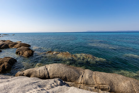 blue transparent sea in the mountainsの写真素材