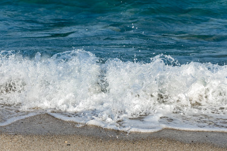 white waves in the blue seaの写真素材