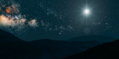 Christmas star shines at night over the mountains of Bethlehemの写真素材