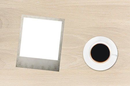 the polaroid card on the wood tableの写真素材