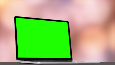modern laptop computer on the table on the bokeh background
