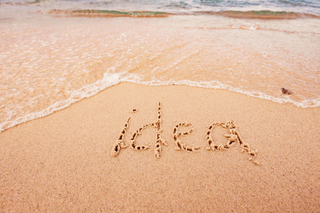 inscription Idea on the seashore with palm treesの写真素材