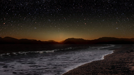 a movement of stars in the night sky with the view of mountains. . High quality photoの写真素材