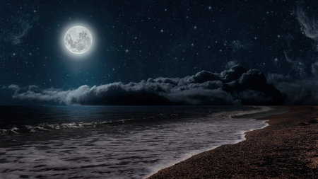 a beautiful view of the night sky with a full moon and stars above the ocean. High quality photoの写真素材