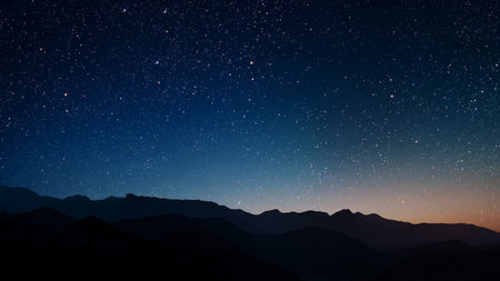aa movement of stars in the night sky with the view of mountains.