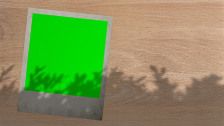 photo card with green screen outdoors, trees swaying in the background.の写真素材