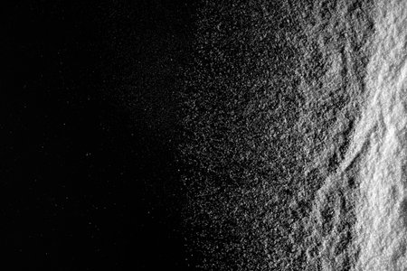 white snow on the black background
