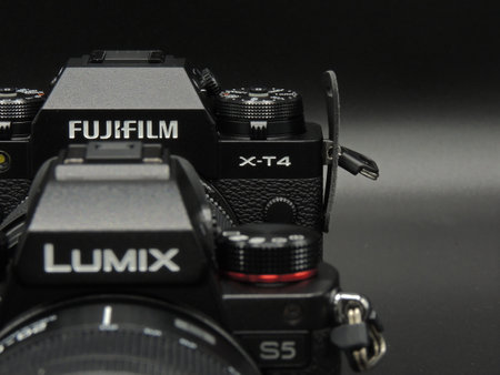 Fujifilm X-T4 and Panasonic Lumix S5 are black top cameras from well-known manufacturers....
